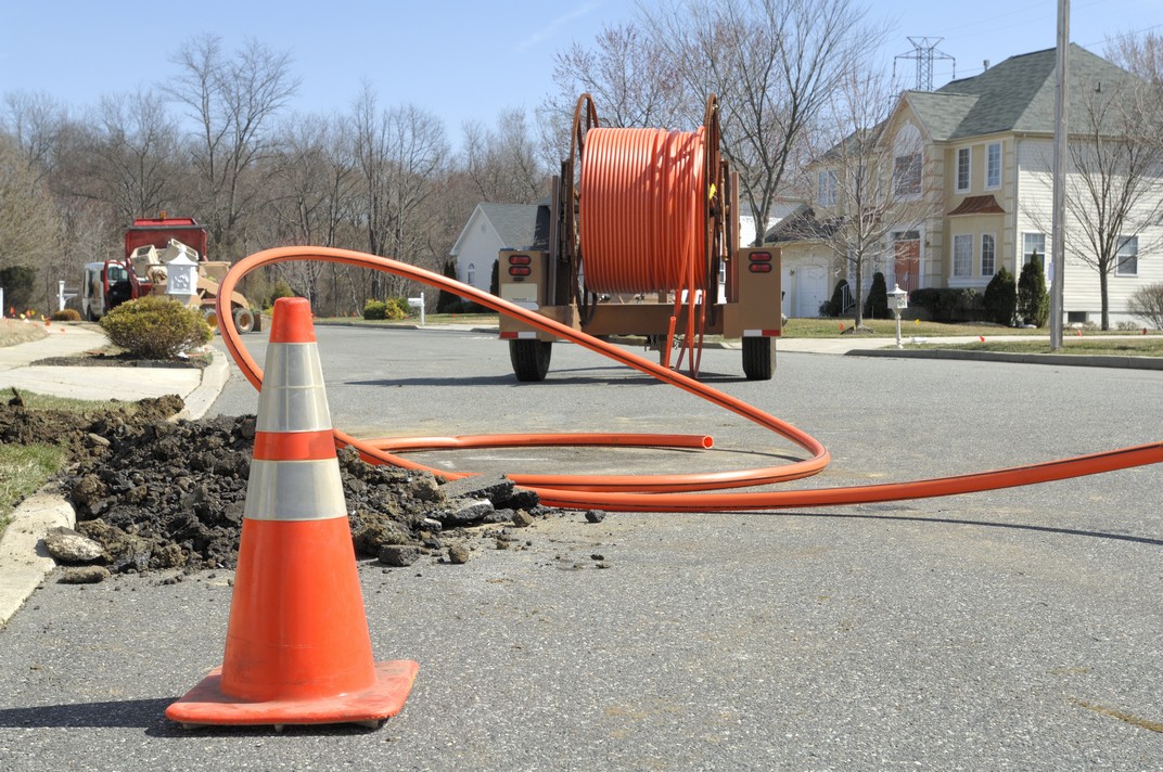 Conduit roll for laying in fiber optic lines.